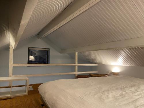 Katil atau katil-katil dalam bilik di Guest house at Heathfield Park