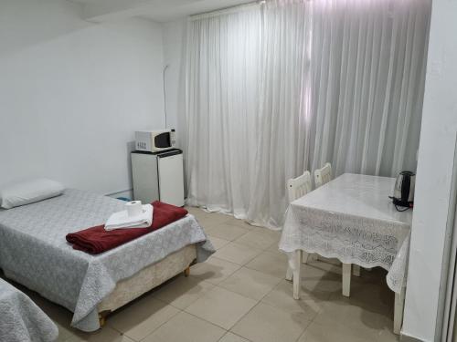 Postel nebo postele na pokoji v ubytování Kit 504 - Asa Sul - Residencial Espaço Brasília Confort KIT 203