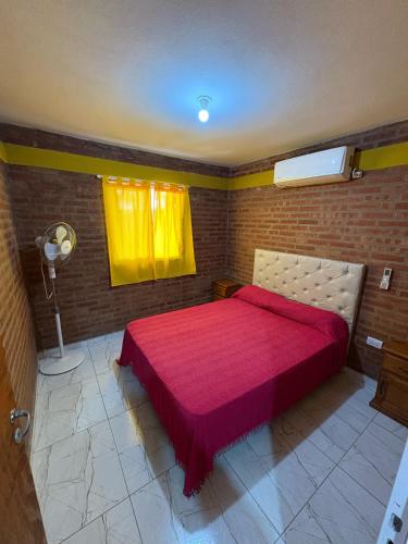 En eller flere senge i et værelse på La bendicion