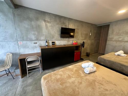 Letto o letti in una camera di Eco Hotel La Colina Mirador Con aire acondicionado