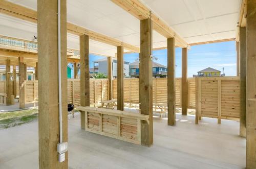 a building under construction with wooden beams at Crystal Sands in Crystal Beach