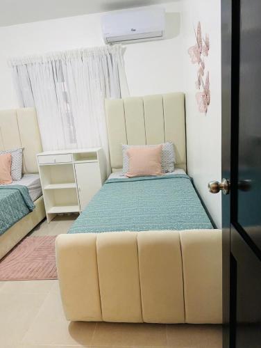 a room with a couch and a bed in it at Luxurious and comfortable 1 level in Juan López