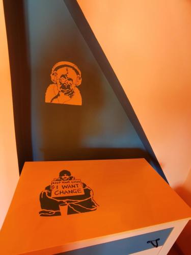 an orange box with a sticker on the top of it at Apartment Altes Kino in Sitzenberg