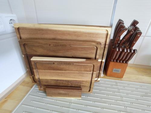 a bunch of wooden knives in a refrigerator at Apartment Altes Kino in Sitzenberg