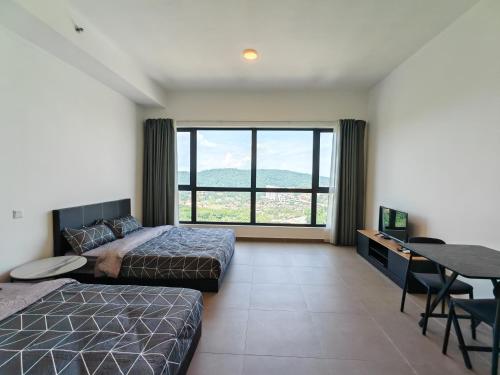 a bedroom with two beds and a desk and a large window at Mossaz minimalist studio 3 in Petaling Jaya