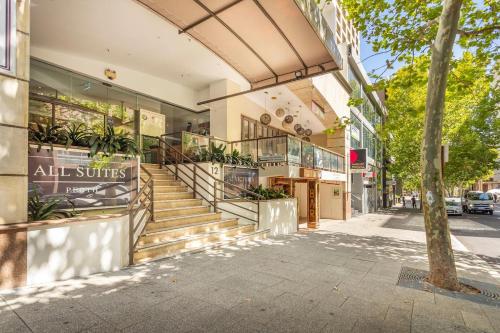 a store front with stairs in front of a building at 806 Deluxe Delight Concert Hall Studio in Perth