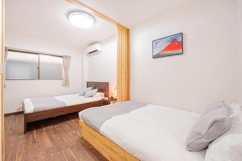 Ueno home 10-minute walk from Ueno Station, 4-minute walk from Inaricho Station, 10-minute walk to Asakusa, 2nd and 3rd floors