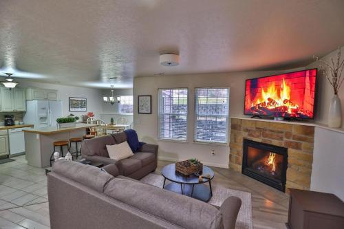 a living room with a couch and a fireplace at Peaceful Retreat In The Heart Of Missoula in Missoula