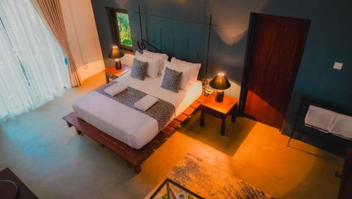 an overhead view of a bedroom with a bed at Clio Bolgoda in Piliyandala