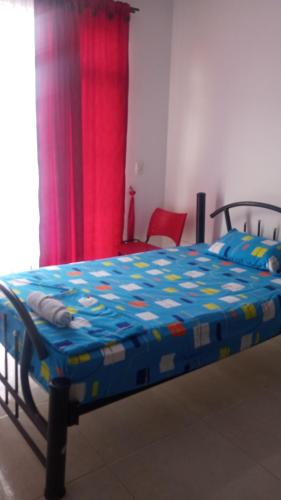 Ein Bett oder Betten in einem Zimmer der Unterkunft Hotel del oeste