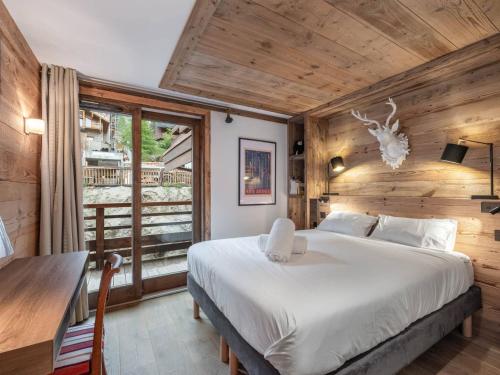 Duplex chic ski aux pieds avec parking et balcon à Méribel