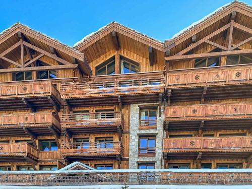 Duplex chic ski aux pieds avec parking et balcon à Méribel