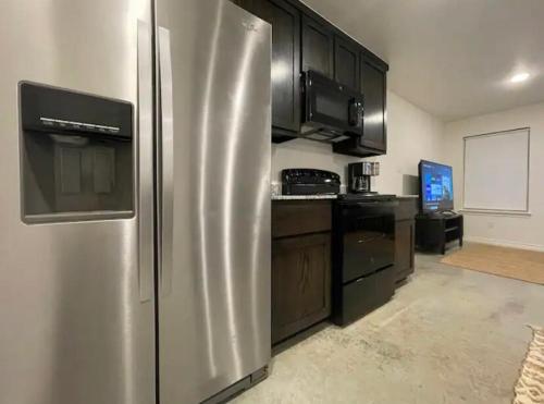 Η κουζίνα ή μικρή κουζίνα στο Deluxe Duplex