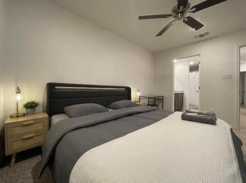 Ένα ή περισσότερα κρεβάτια σε δωμάτιο στο Deluxe Duplex