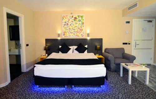 Кровать или кровати в номере Tempo Hotel Caglayan