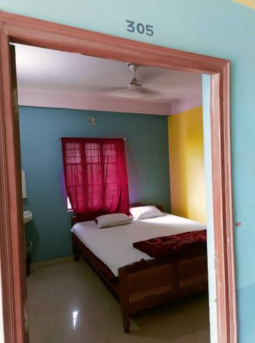 Katil atau katil-katil dalam bilik di Hotel O Shree hotels