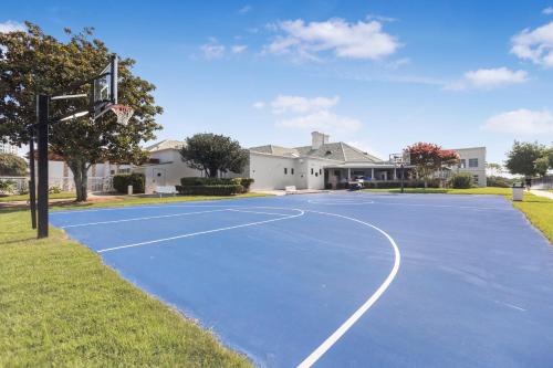 a basketball court in front of a house at Silver Shells in Destin