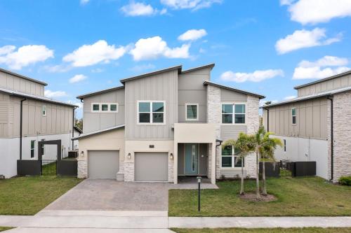 an image of a house with a driveway at 390 Strand Drive in Melbourne Beach