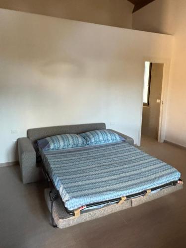 Una cama o camas en una habitación de Masseria I Pini