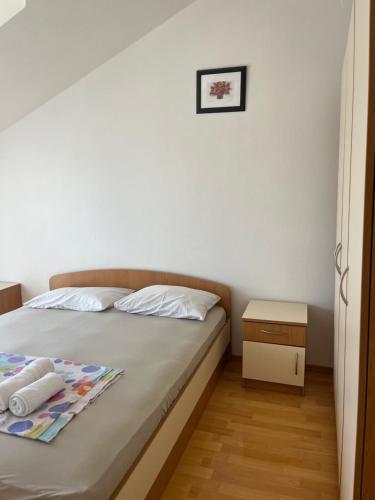 Кровать или кровати в номере Apartments Dada