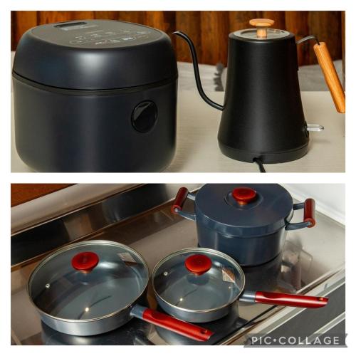 a stove with two frying pans and a pot on it at Ｊ Studio Oarai in Hokota