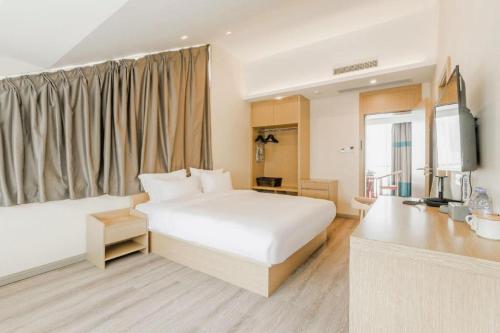 Postel nebo postele na pokoji v ubytování ZMAX Hotels Wuhan East Lake