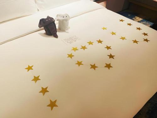 Ένα ή περισσότερα κρεβάτια σε δωμάτιο στο Onejee Hotel Shenzhen