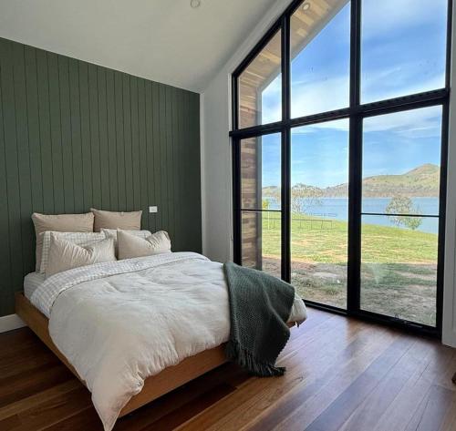 Postel nebo postele na pokoji v ubytování The Barn Bonnie Doon