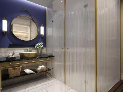 Koupelna v ubytování Metropolo Hotel Wuchuang Jiangtan Jiyuqiao Metro Station