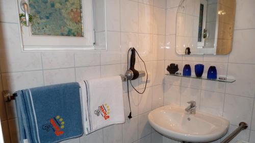 Koupelna v ubytování Haus Floresa