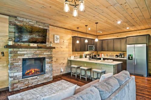 a living room with a couch and a fireplace at NEWLY BUILT Amazing View Chalet Perfect Location in Gatlinburg