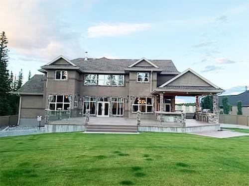 a large house with a large lawn in front of it at A Gorgeous Mansion for Jasper Vacation in Hinton