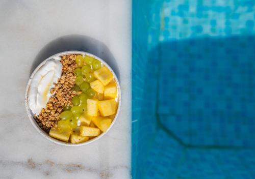 a food processor filled with fruit and ice cream at La Luna Hotel in Troulos