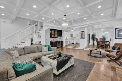 a large living room with a couch and a table at Stunning 6BR Buckhead OasisPrivate BathEachRoom in Atlanta