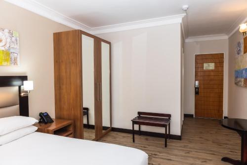 Letto o letti in una camera di Premier Splendid Inn Pinetown