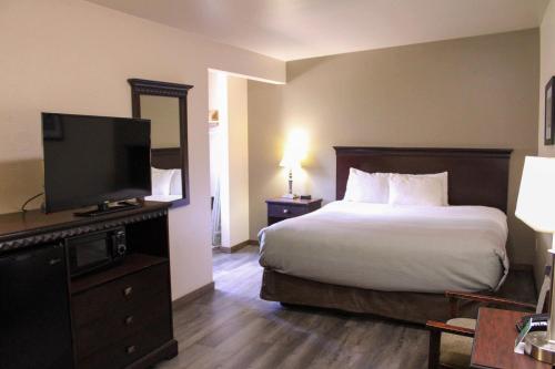 Postel nebo postele na pokoji v ubytování Quality Inn Gunnison-Crested Butte