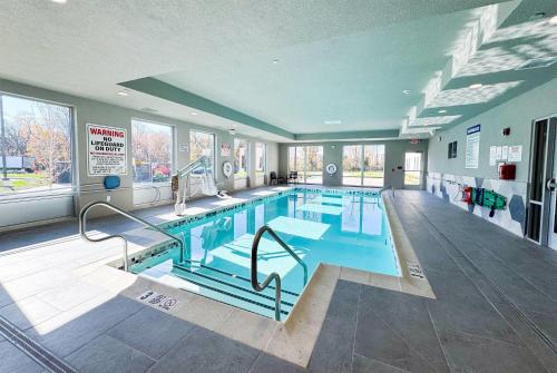 a large indoor swimming pool in a building at Hawthorn Extended Stay by Wyndham Mount Laurel Moorestown in Mount Laurel