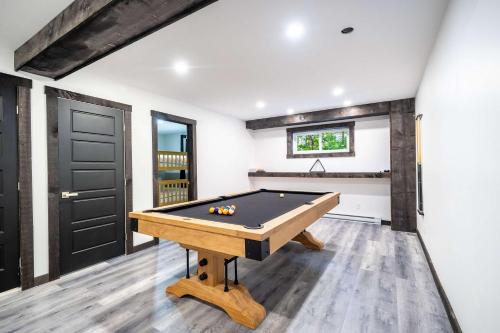 a billiard room with a pool table in it at Spa & Pool table - Ivy Cottage in Scott