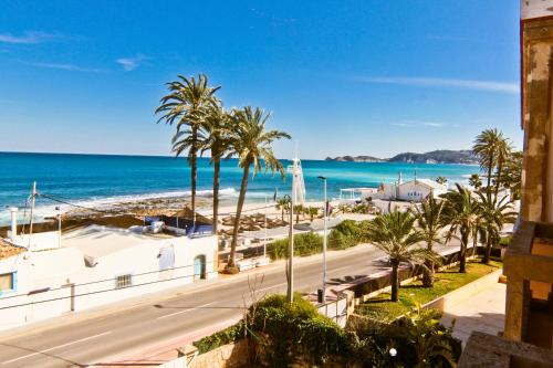 a view of the beach from a building at Botanico Beauty Villa del Mar in Jávea