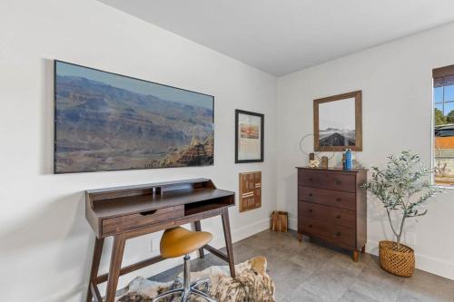 a room with a wooden desk and a dresser at Polar Express Hot Tub Pool Table Mountain Views in Williams