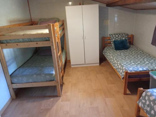 Postel nebo postele na pokoji v ubytování Le Gîte Vert