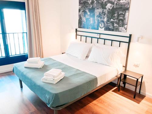 Ένα ή περισσότερα κρεβάτια σε δωμάτιο στο NeapolitanTrips Affittacamere