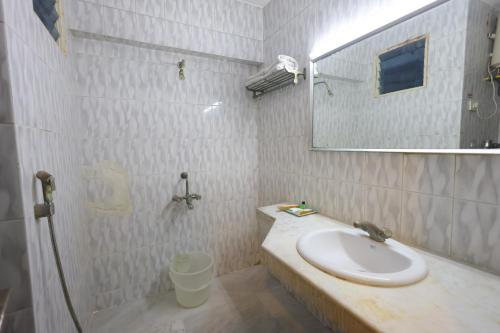Koupelna v ubytování Hotel PLR Grand
