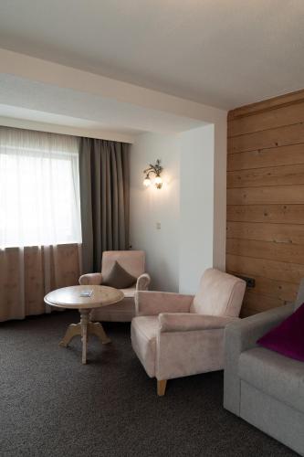 Ruang duduk di Wellnesshotel Mein Almhof Superior