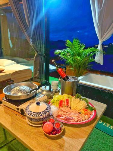 a table with a tray of food on it at One dayภูทับเบิก in Ban Maeo Thap Boek