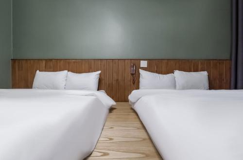 Katil atau katil-katil dalam bilik di Pure Stay Jeju City
