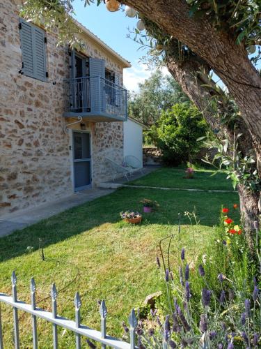 a view of the house from the garden at Messinian Stone House in Messini