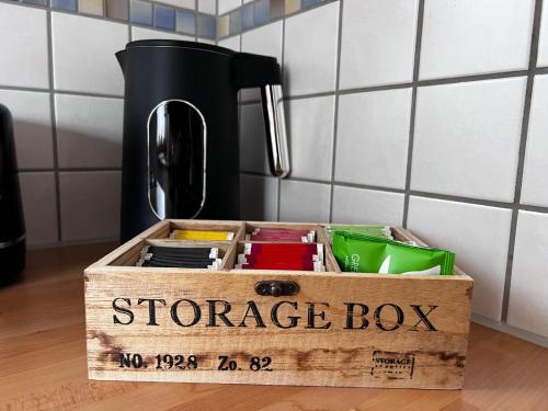 a wooden box with a sign that says starr box at Alpenruhe Kranzegg in Rettenberg