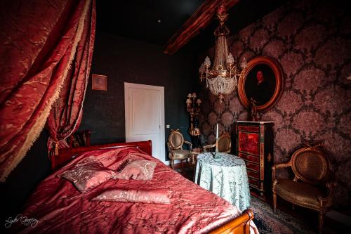 Letto o letti in una camera di Le domaine du château blanc à 10 minutes de Pairi Daiza
