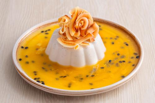 a bowl of soup with noddles on top of it at BelAire Bangkok Sukhumvit in Bangkok